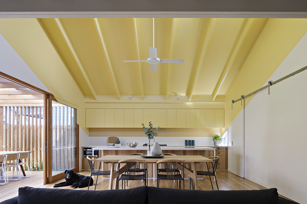 Joyful House yellow living area