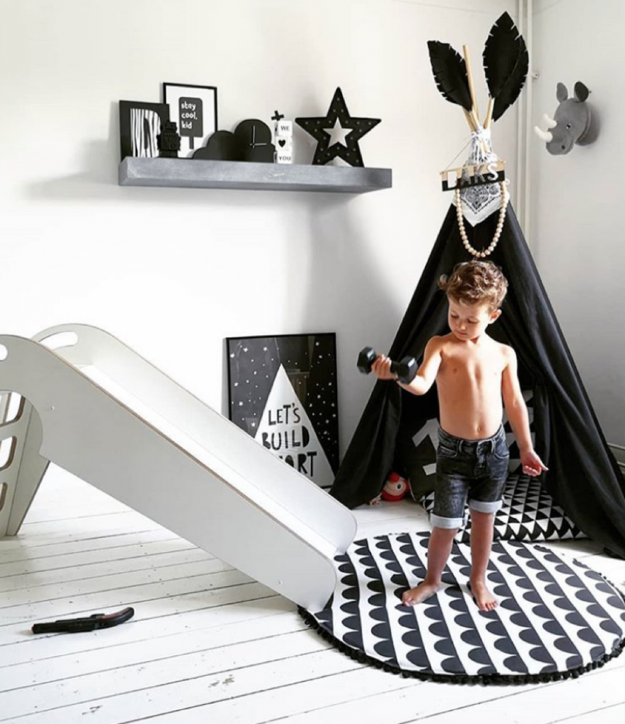 Little boys black and white room with teepee