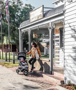 Margaux Follis with daughter in pram