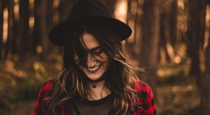 Women smiling in the woods