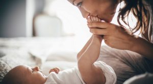 Feng shui your nursery Mum kissing baby's feet