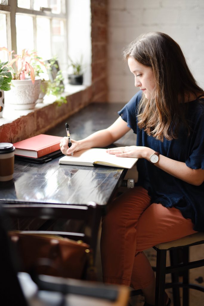 Woman working at cafe