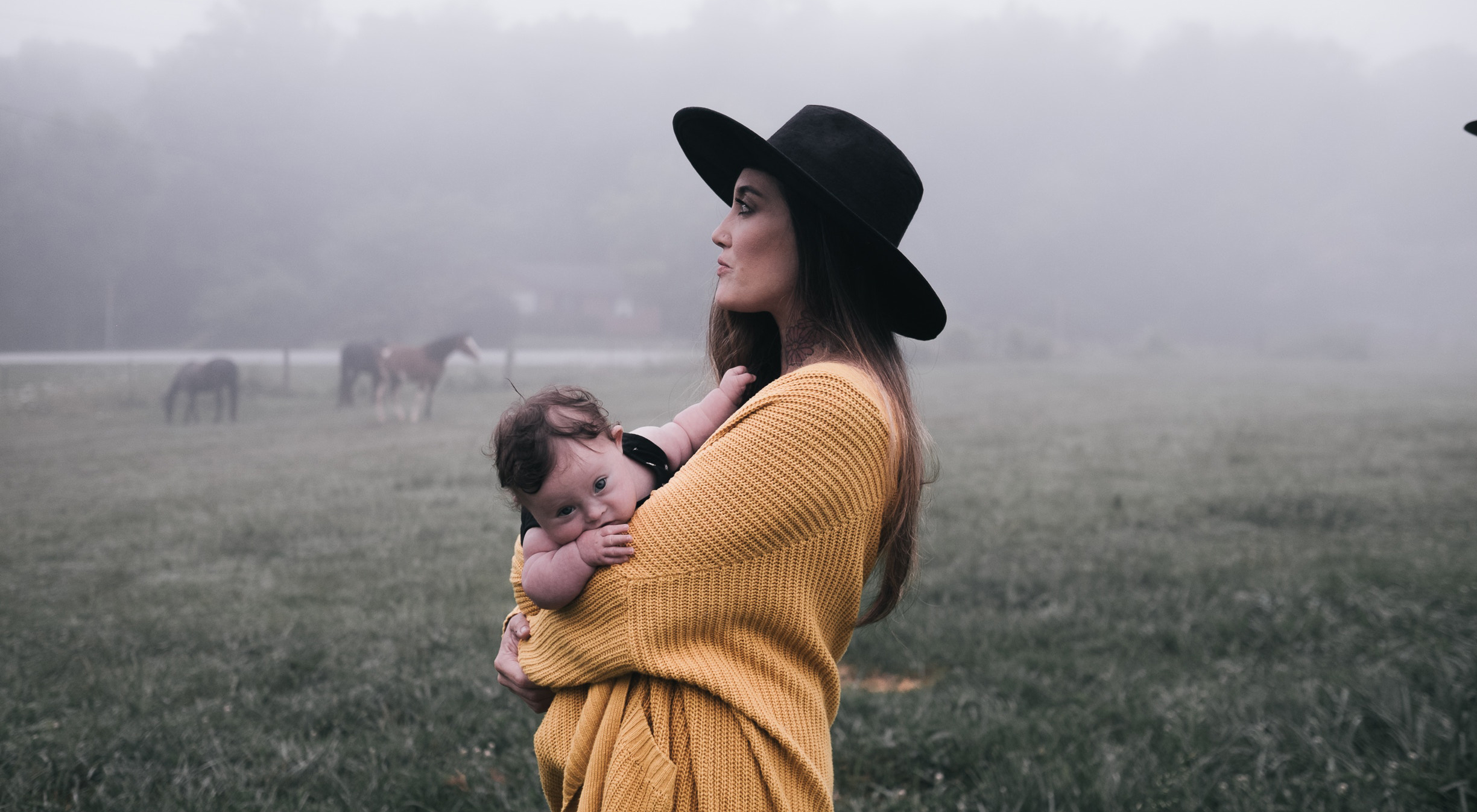 Signs of Burnout Contraception Options After Pregnancy Mum holding baby with horses in background