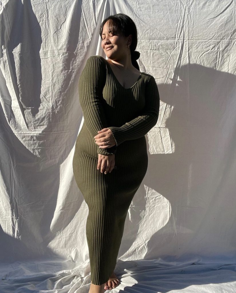 @stylenotsize posing in olive dress