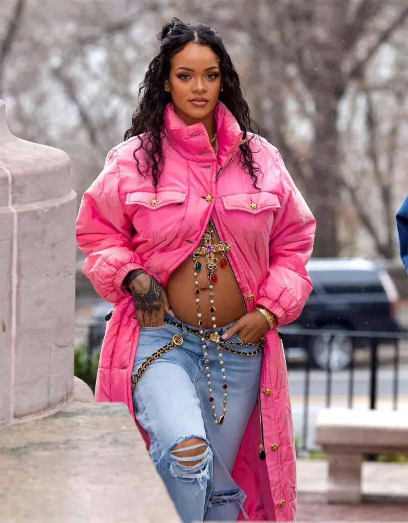 Rihanna pregnant in a pink coat