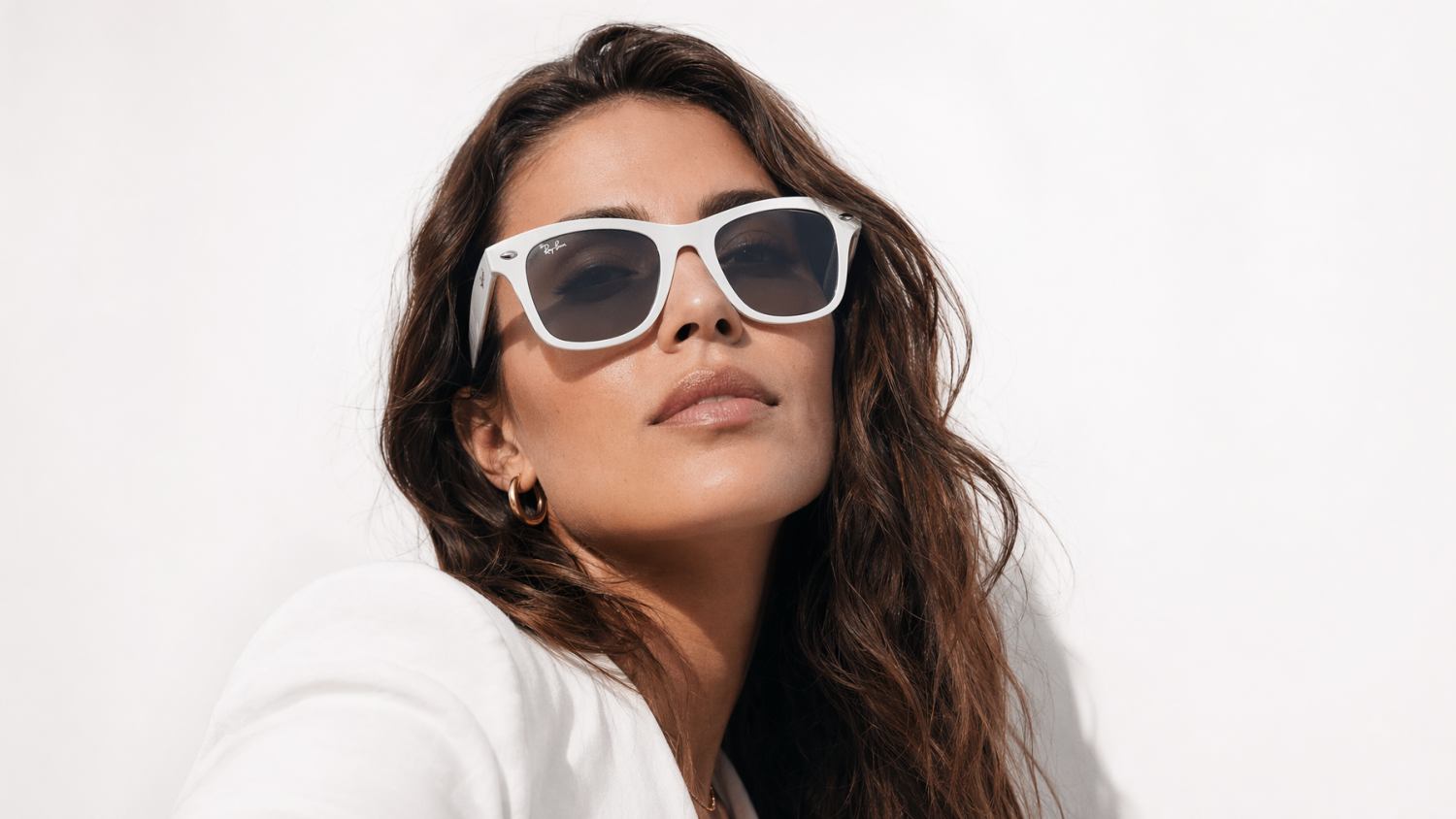woman wearing white ray-ban sunglasses