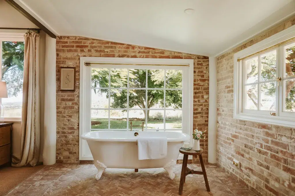 The Gatehouse mineral pool overlooking rolling green hills in the Brisbane Valley